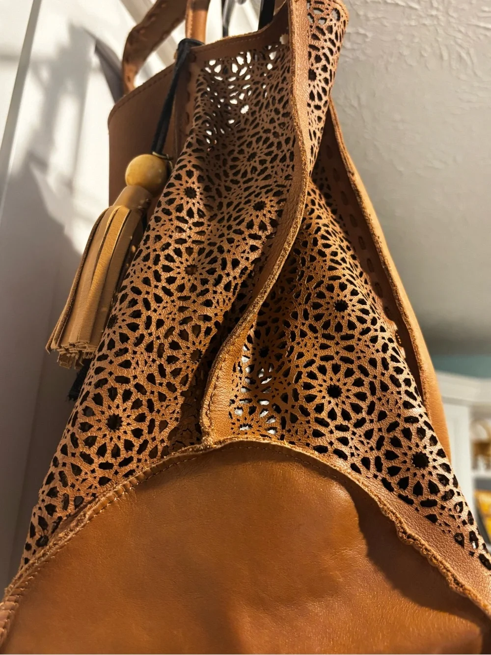 The Sak Laser-Cut Leather Hobo in Cognac